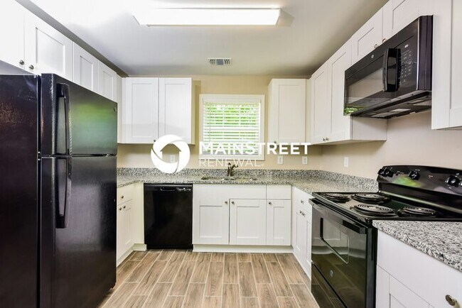Building Photo - 4 Bedroom Pet-Friendly Home in Conley, GA with Main Street Renewal