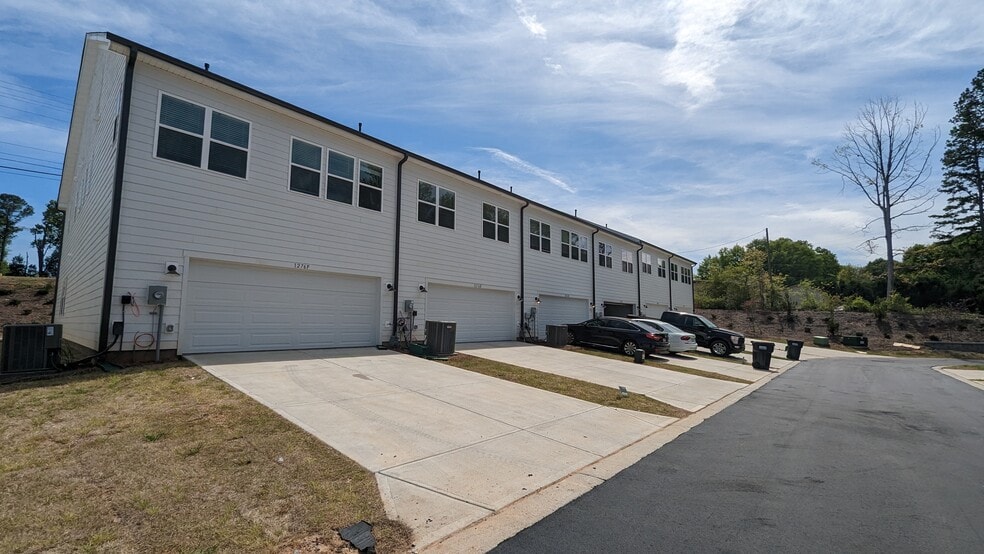 Rear view garage side with driveway - 1276 Brawley School Rd