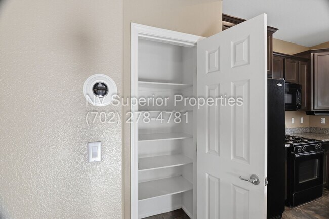 Building Photo - NW!! 4 Bedrooms!!! One Bedroom Down!!  Pool!!! Tankless Hot Water Heater!! Court yard at entrance...
