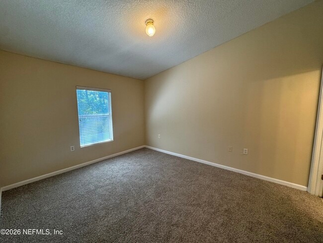 Building Photo - 5051 Playpen Dr