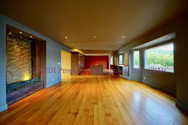 Building Photo - Sleek, Expansive, Designer Home with Priva...