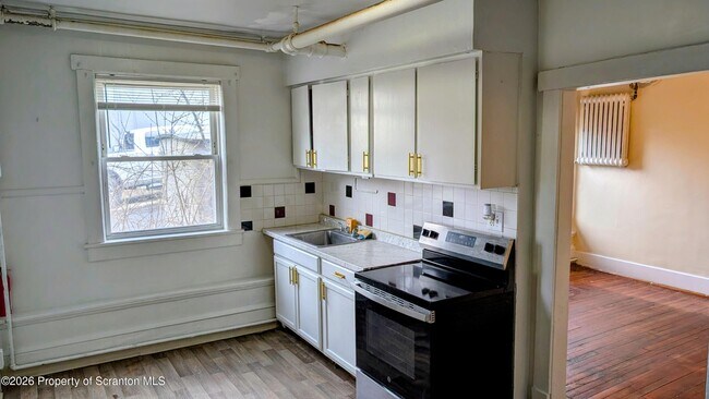 Building Photo - 1411 N Washington Ave