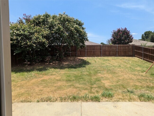 Building Photo - 8820 Wagon Trail