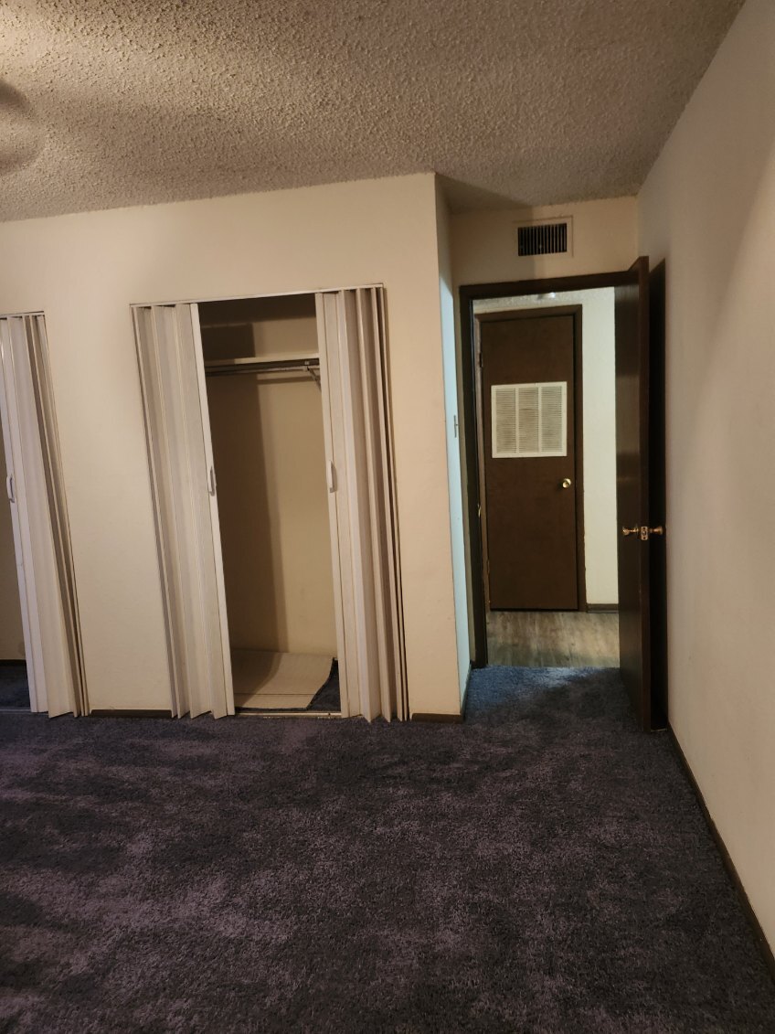 Master Bedroom with half bath - 3030 Congress Blvd