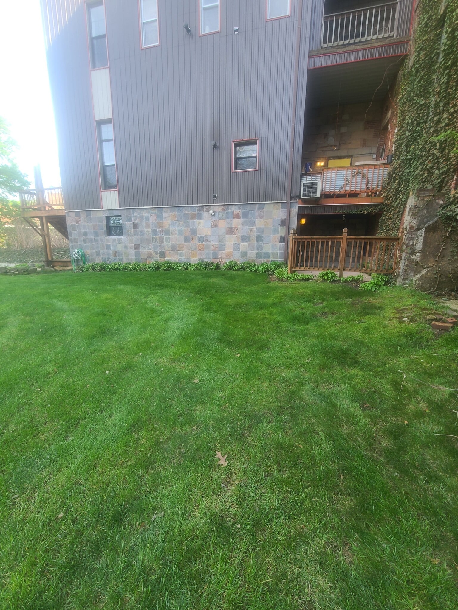 View of unit from side w/ Patio - 277 Bluff St