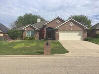 Building Photo - Home for the Holidays 4/2/2 with Fireplace - Wonderful YARD - Community Pool