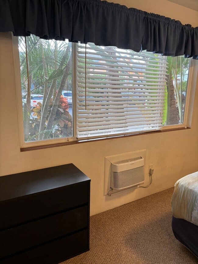 Building Photo - Move-In Ready 2BR/2BA Condo – Fully Furnished, AC, Washer/Dryer, 2 Parking stalls