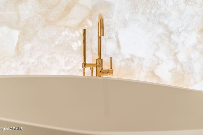 Building Photo - 6587 N Palmeraie Blvd