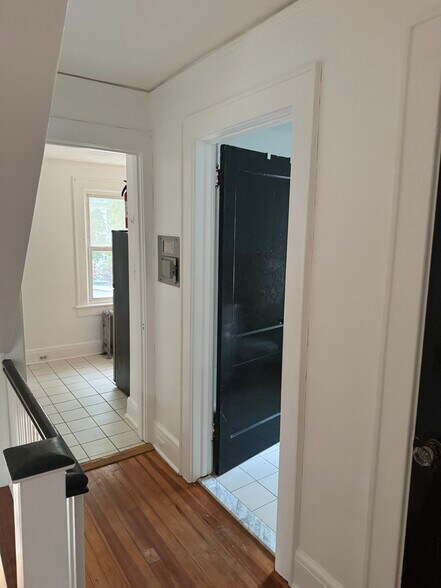 Hallway view of kitchen and bathroom view - 836 W 6th St