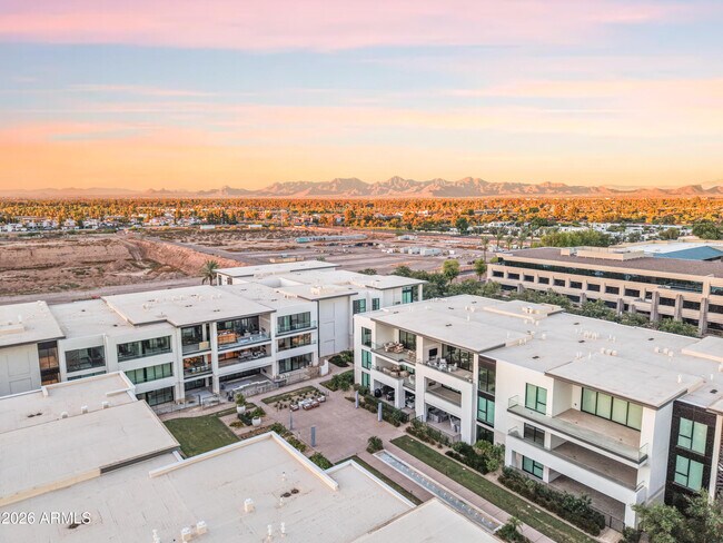 Building Photo - 6587 N Palmeraie Blvd