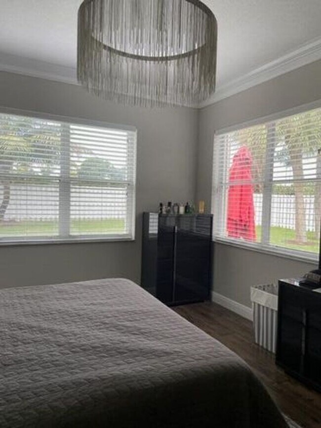 Building Photo - 7891 Manor Forest Blvd