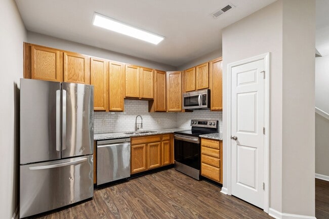 Building Photo - Raleigh Retreat: Modern 3BR Townhome with ...