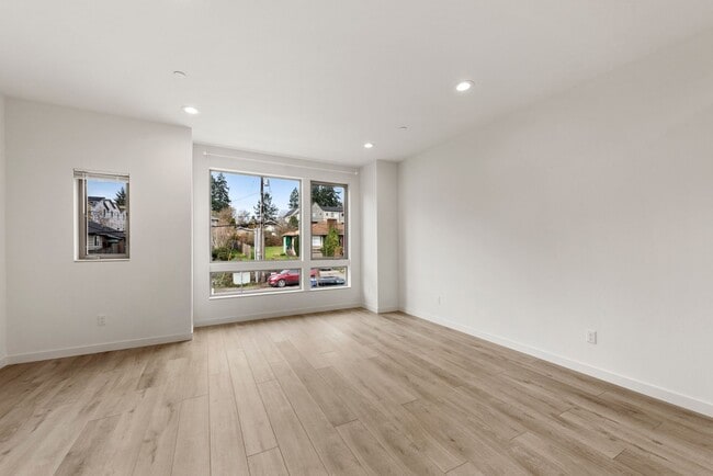 Building Photo - Modern 3 Bed 3.5 Bath Townhome with Garage, Balcony and Fenced Yard Near Light Rail