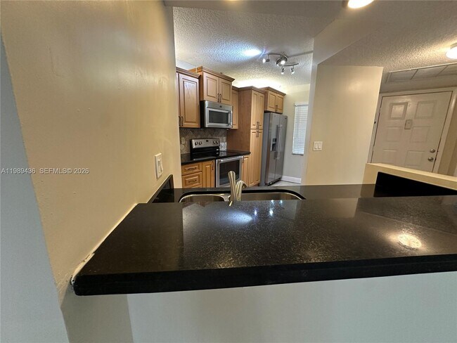 Building Photo - 10401 W Broward Blvd