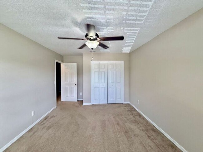 Building Photo - LARGE AND SPACIOUS 4/3 HOME IN EAST ORLANDO WEDGEFIED COMMUNITY