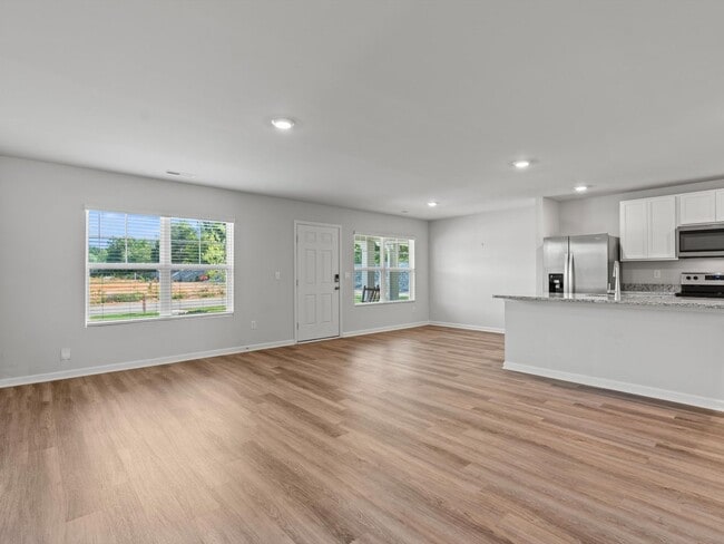 Building Photo - Fantastic Location – Spacious 3 Bedroom Townhome with Rear-Entry Garage!