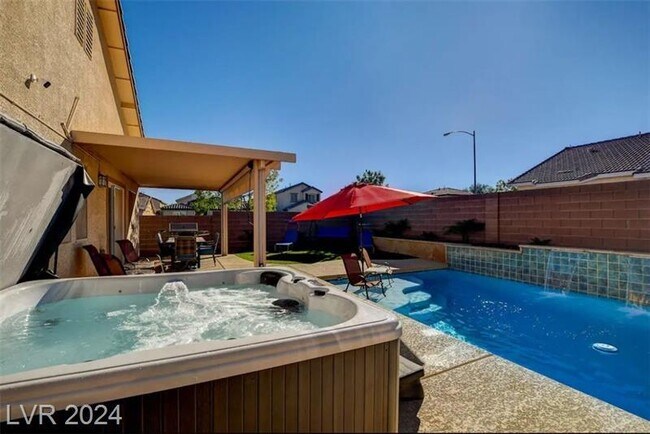 Building Photo - Entertainment Paradise: Fully Equipped Home with Heated Pool and Spa!