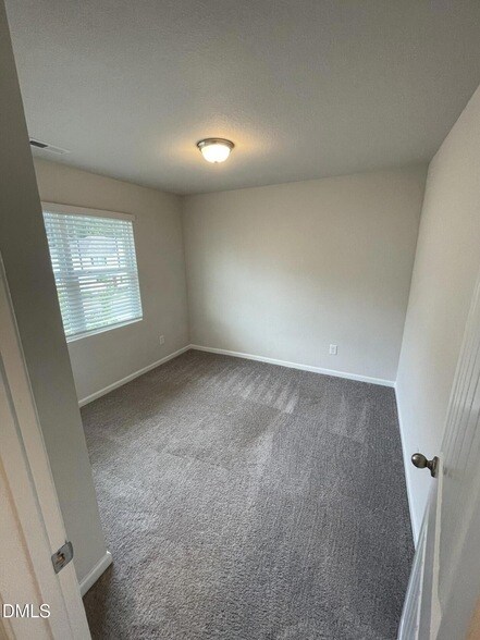 Building Photo - 2021 Wiggins Village Dr