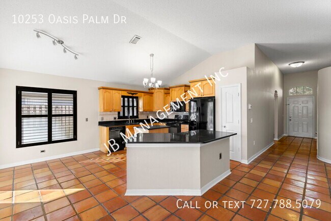 Building Photo - 10253 Oasis Palm Dr