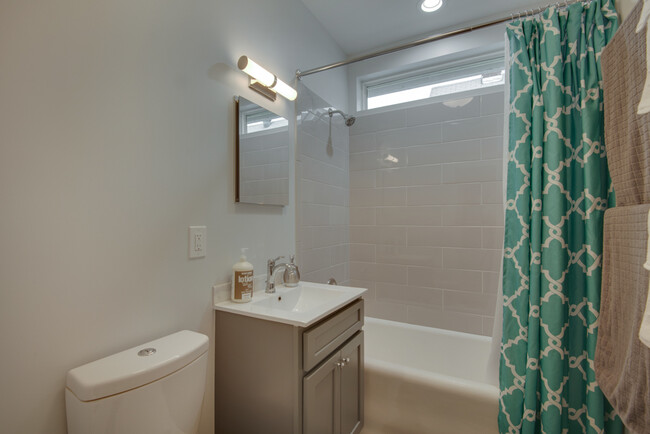 The brand new bathroom that is between the two smaller bedrooms - 3020 Columbus Ave