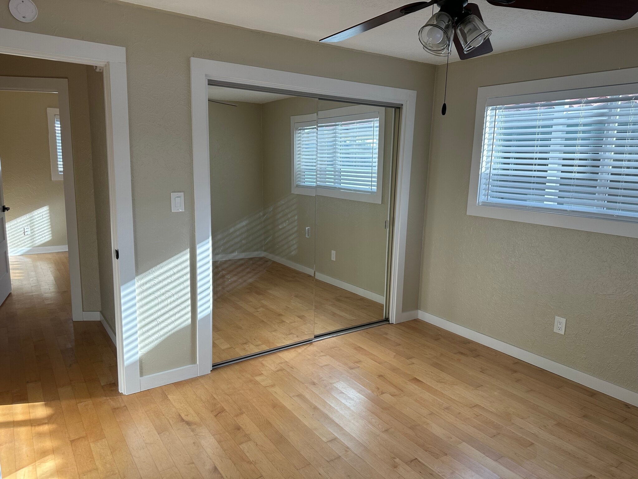 The front bedroom has a large closet, and two big windows with great views of the water. - 1879 N Jantzen Ave