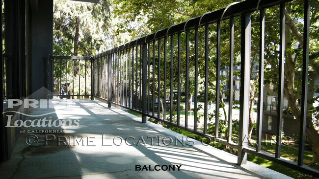 Building Photo - Experience Downtown Living with this upgra...