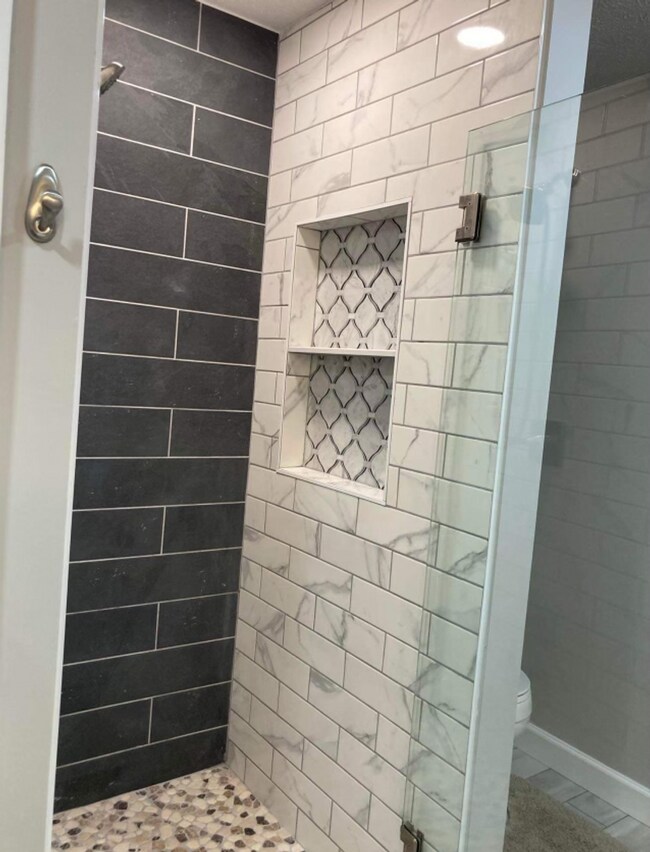 Building Photo - Updated & Landscaped 4 Bedroom, 4 Bath Hom...