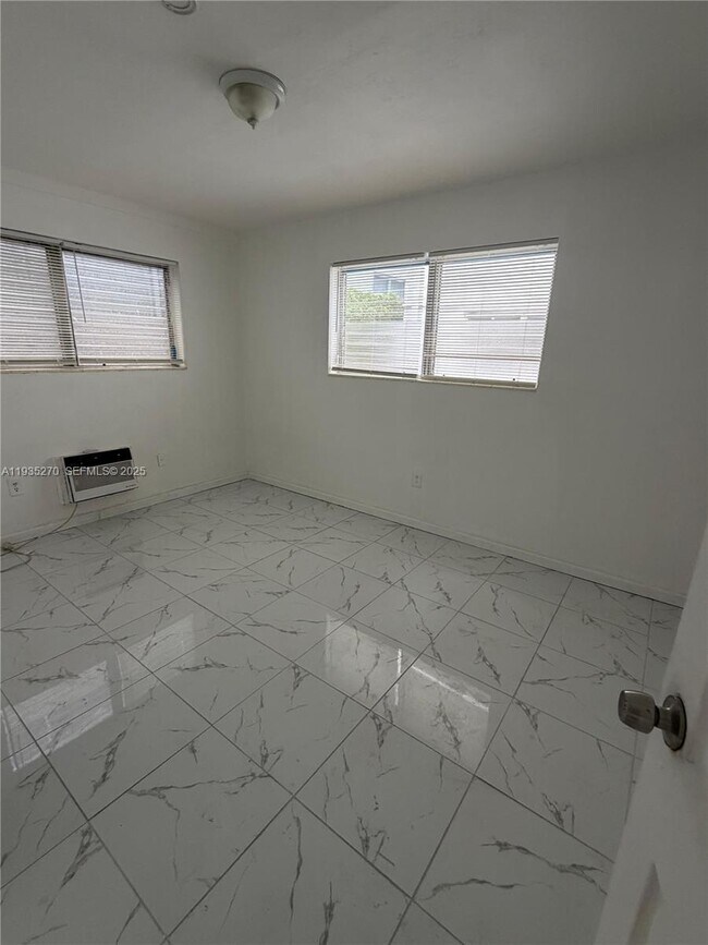 Building Photo - 7730 Dickens Ave