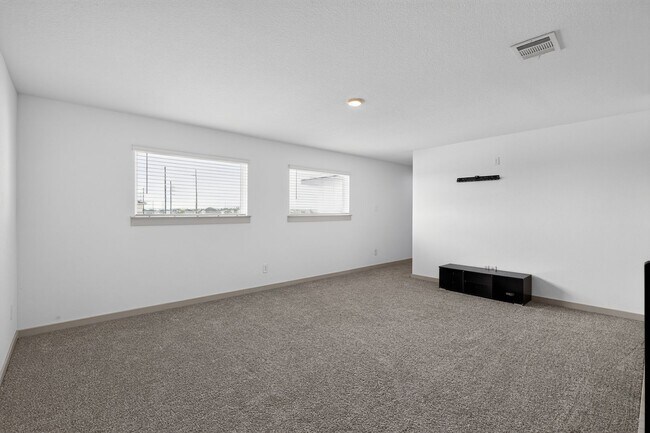 Building Photo - Like-New 4-Bedroom Corner Lot Home with Game Room, Appliances Included & Private Backyard