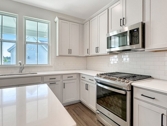 Building Photo - Beautiful, 3-Bedroom Midtown Nexton Townhome with Garage & Amenities