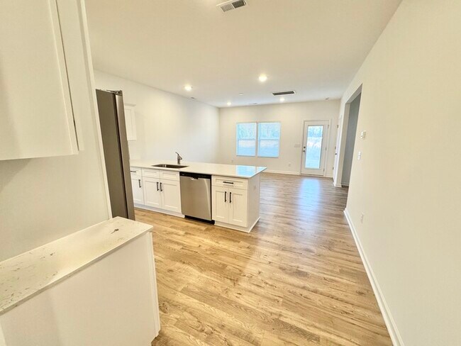 Building Photo - Three bedroom 2 1/2 bath single-family home in the new Kensington community