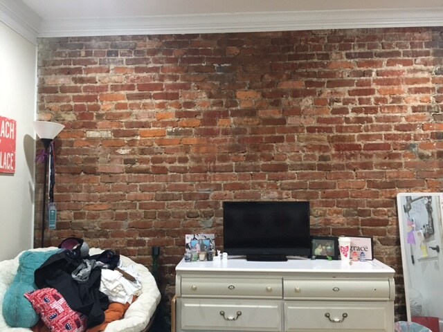 exposed brick wall - 629 4th St NE