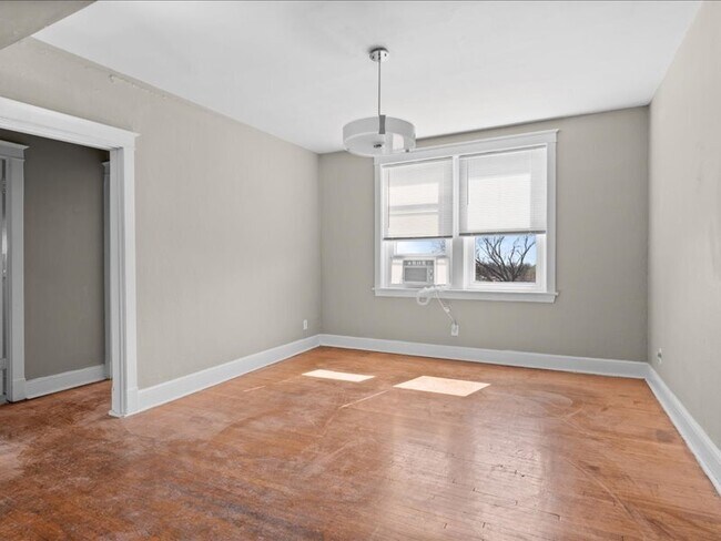 Building Photo - 7204 Zephyr Place - 2E