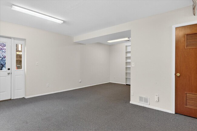 Building Photo - 4BR/4BA Updated Home with Finished Basement Suite & Landscaped Yard