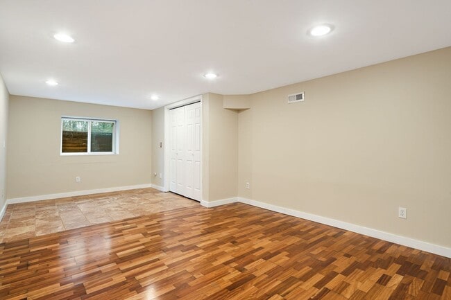 Building Photo - Rural Retreat in Candler with Bonus Room (Heat, Water, & Lawn Maintenance Included)