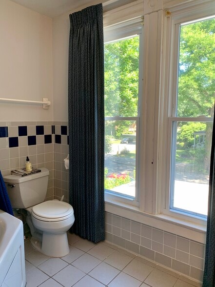 Master bedroom with private bathroom and heart shaped jacuzzi tub - 457 Park Ave