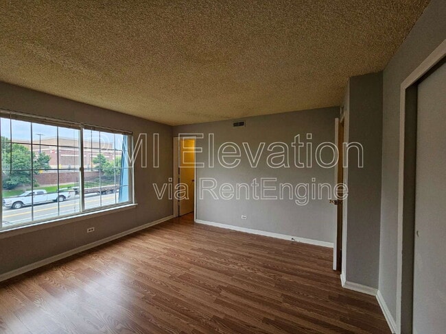 Building Photo - 9430 E Girard Ave