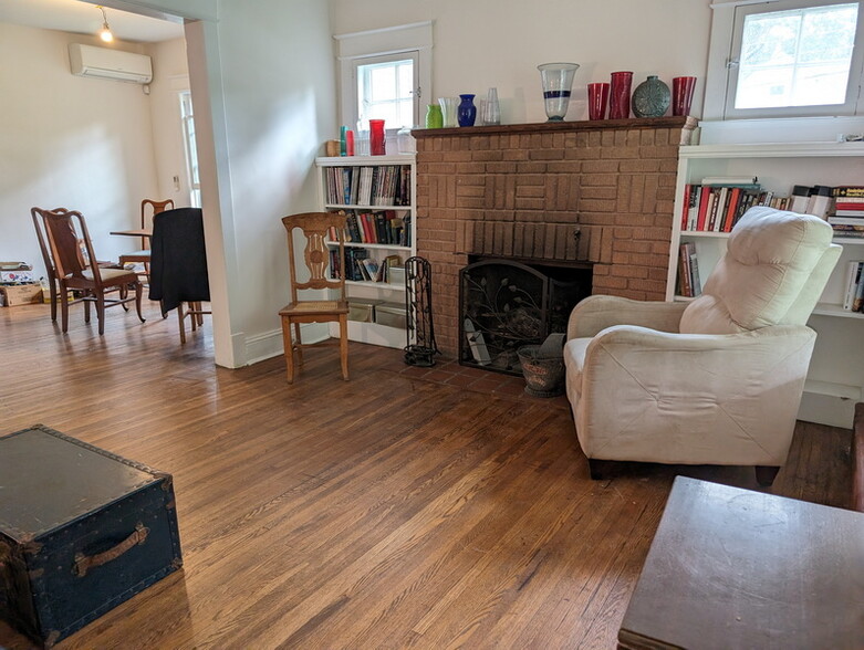 Living room dining room fireplace - 4216 Queensbury Rd