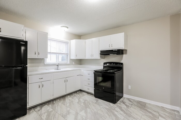 Building Photo - 907 N Yuma Ave