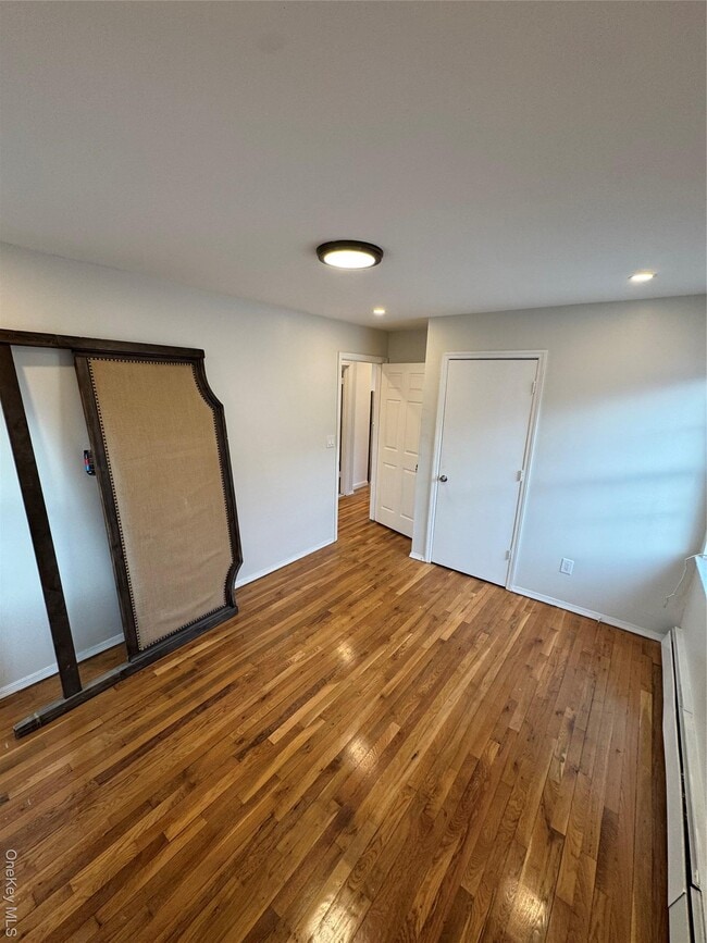 Building Photo - 69-43 Almeda Ave