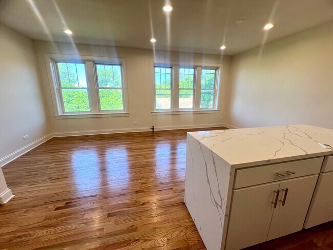 Building Photo - Brand New Renovation! 3 BR/ 2 BA On Quiet ...