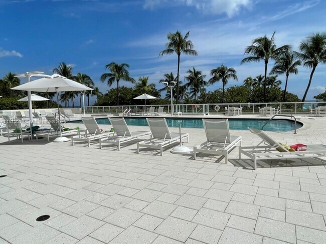 Building Photo - 10185 Collins Ave