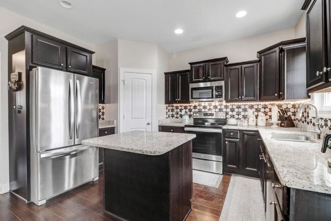 Building Photo - STUNNING & SPACIOUS 4 BR | 2.5 BA 2-Story *Pikeville School District*