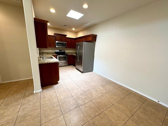 Building Photo - 8940 W Olive Ave