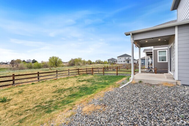 Building Photo - LOOK AND LEASE: MAY RENT FREE Spacious 4BD...