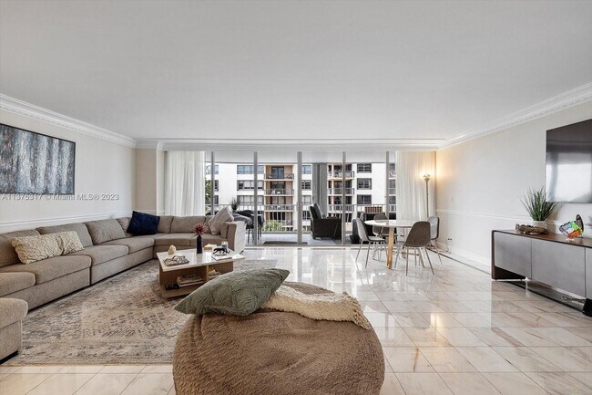 Building Photo - 10155 Collins Ave