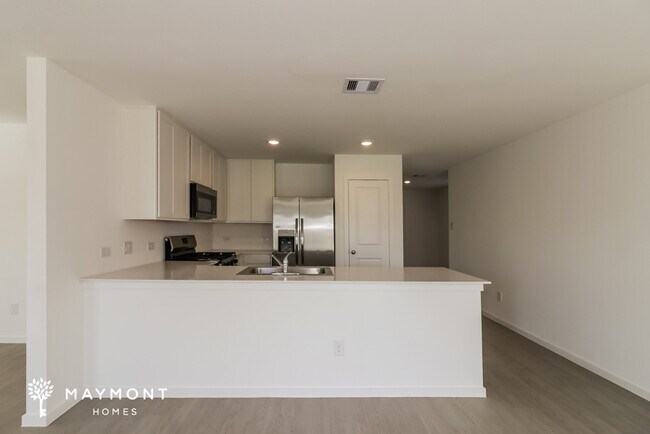 Building Photo - Now Leasing in Sunterra with Top-Tier Amenities