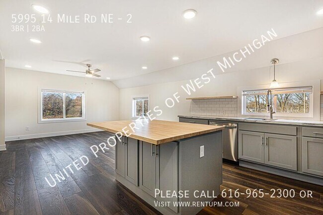 Building Photo - 5995 14 Mile Rd NE