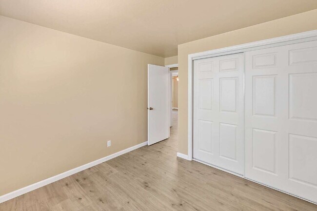 Building Photo - 3-Bedroom with A Flex Room Multi-Level Home with Fresh Paint, Refreshed Deck, and Multiple Living...