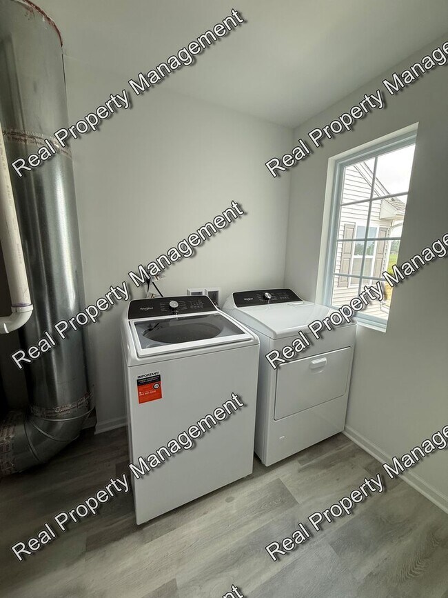 Building Photo - New Construction 3 Bedroom Townhome